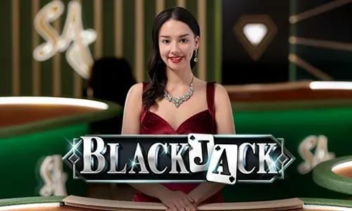 Live casino dealer at a blackjack table